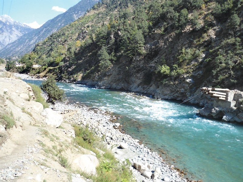 nearest route to cross the river is a foot bridge in another village two miles away most schools are across the river and children from ramait have to walk the distance to get to the other side photo express