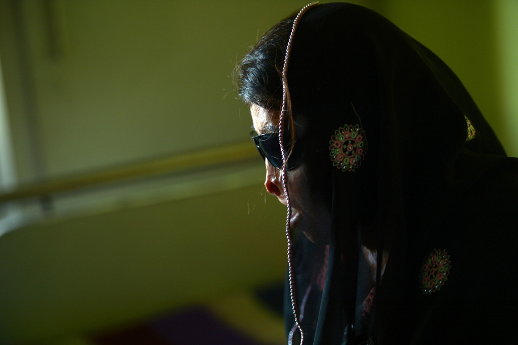 an acid attack victim waits for eye surgery at a hospital in rawalpindi photo afp