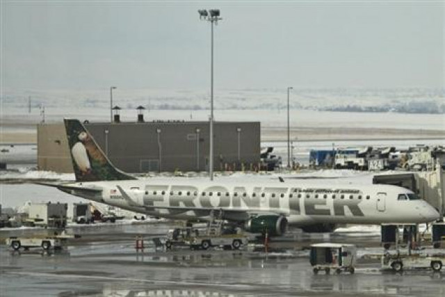 a frontier airlines jet waits at the gate prior to departure at the denver international airport in denver colorado photo reuters a frontier airlines jet waits at the gate prior to departure at the denver international airport in denver colorado photo reuters