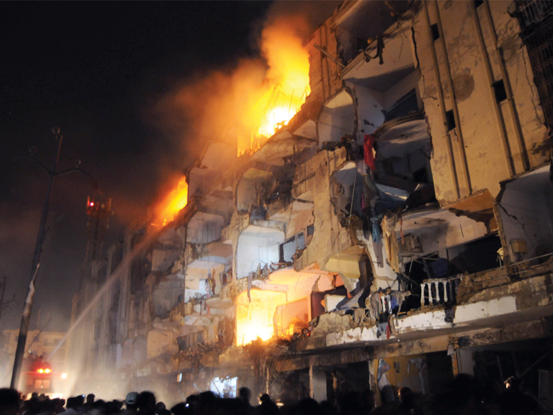 flats in iqra city and rabia flower apartments burn as the powerful blast struck abbas town photo express