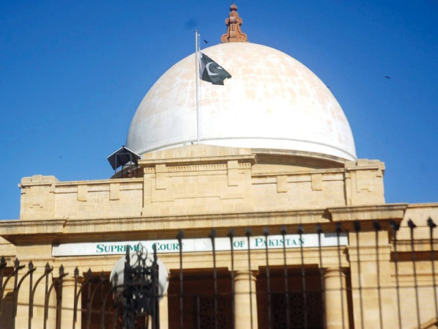 the flag flies at half mast at the supreme court registry in karachi following two bomb blasts at abbas town courts below wore a deserted look as lawyers boycotted all legal proceedings on monday photo ppi express the flag flies at half mast at the supreme court registry in karachi following two bomb blasts at abbas town courts below wore a deserted look as lawyers boycotted all legal proceedings on monday photo ppi express