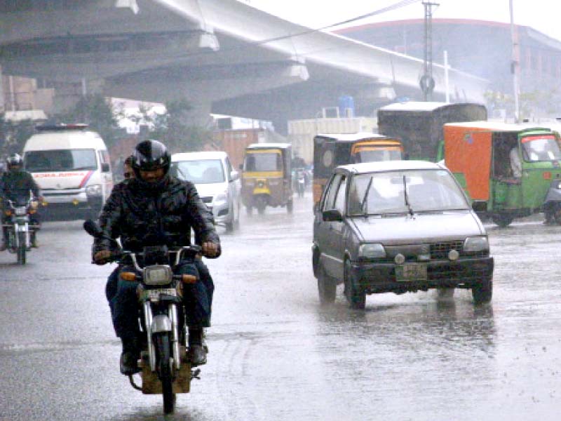 heavy downpour in lahore and other parts of the province caused devastating damage as two cars among other property were struck by thunder in faisalabad photos express ppi