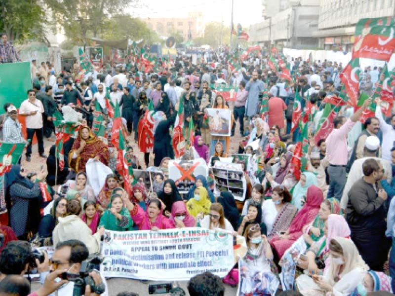 pakistan tehreek e insaf leaders and workers staged a protest outside the karachi press club demanding the release of op position leader in sindh assembly haleem adil shaikh photo jalal qureshi express