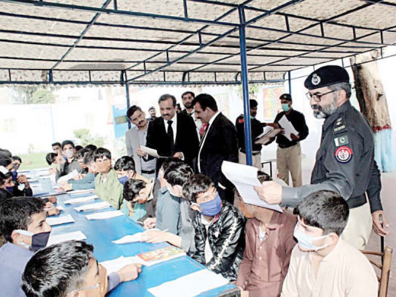 rawalpindi additional district and sessions judge malik asif inquires about problems faced by inmates at adiala jail photo express