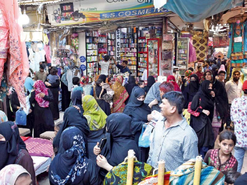 a view of a marketplace in karachi photo online file