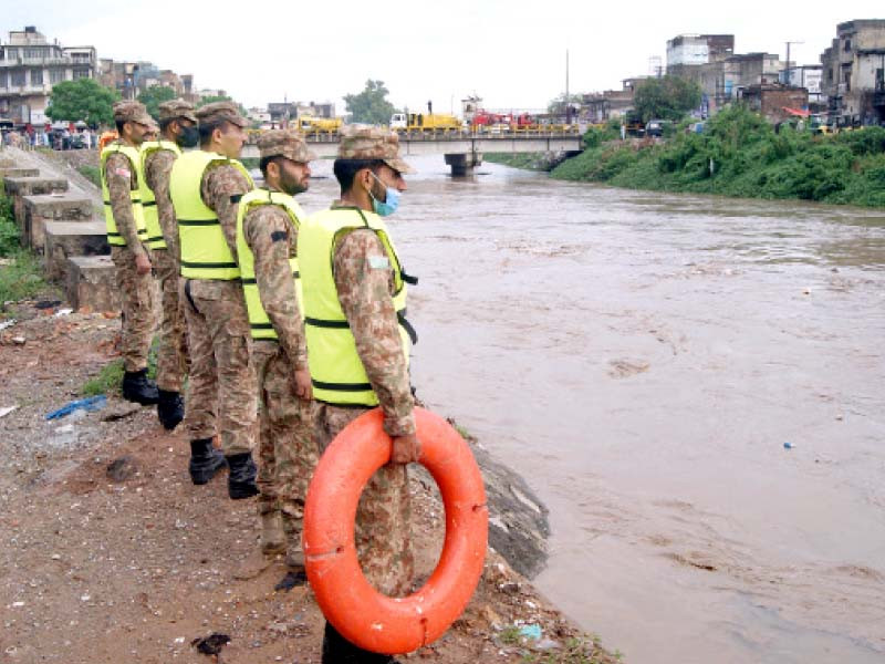 pakistan army soldiers are deployed at nullah leh for rescue purposes after the water level crossed 19 feet after heavy rains on friday photo online file