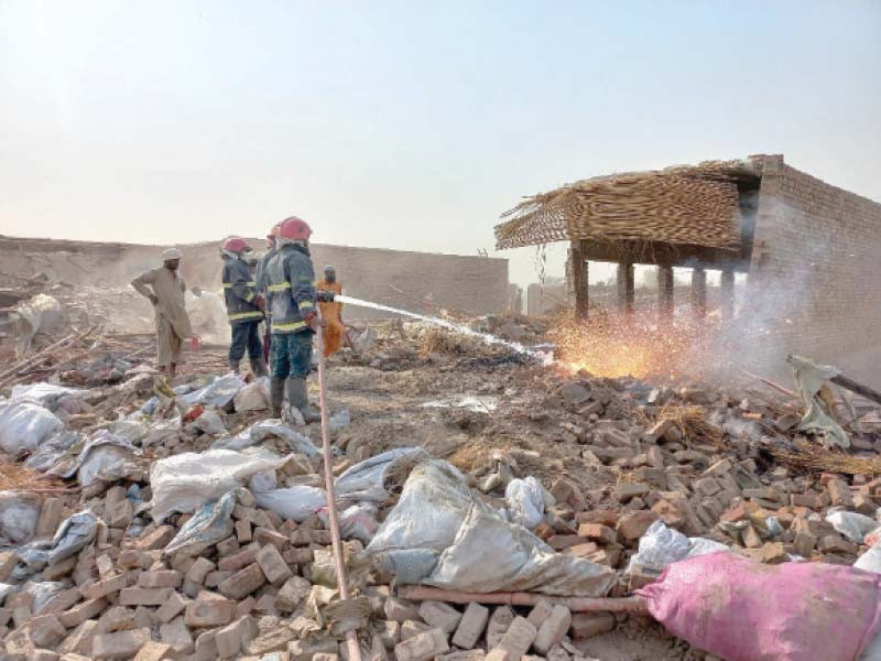 rescue 1122 workers put out a fire that erupted at a firecracker factory photo express