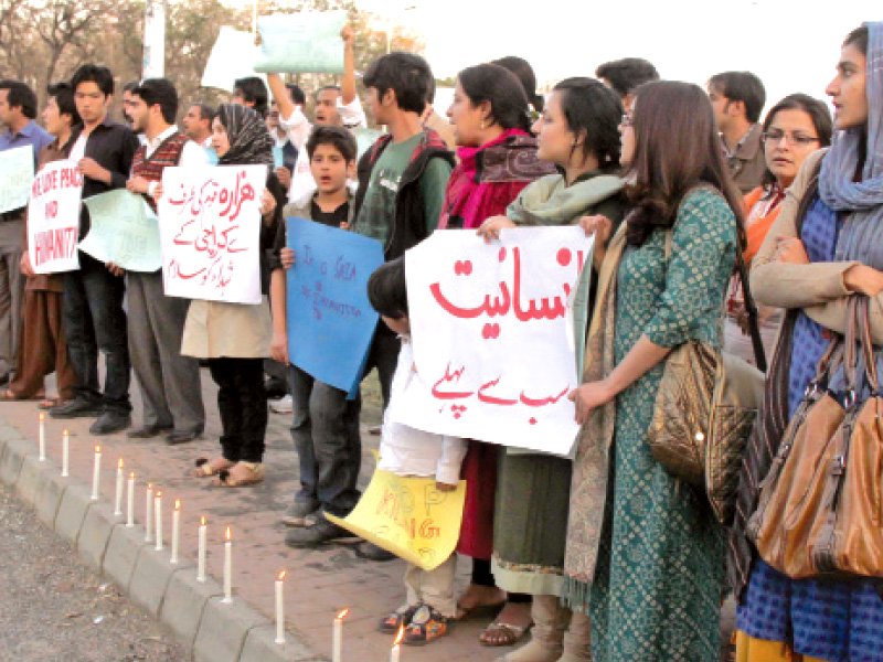 the protesters raising slogans against government at the vigil on tuesday photo muhammad javaid express