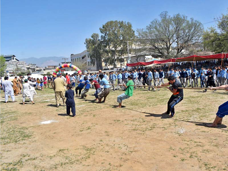competition students take part in a tug of war at the festival photo express