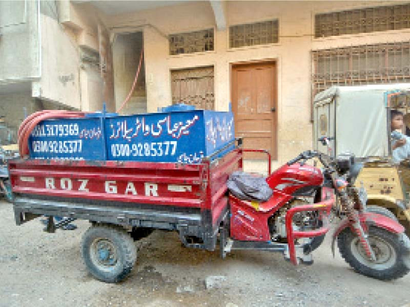 a man delivers water on a loader rickshaw these three wheelers are seen as taking over the business of light cargo vehicles but complaints of rash driving are rife photo jalal qureshi express