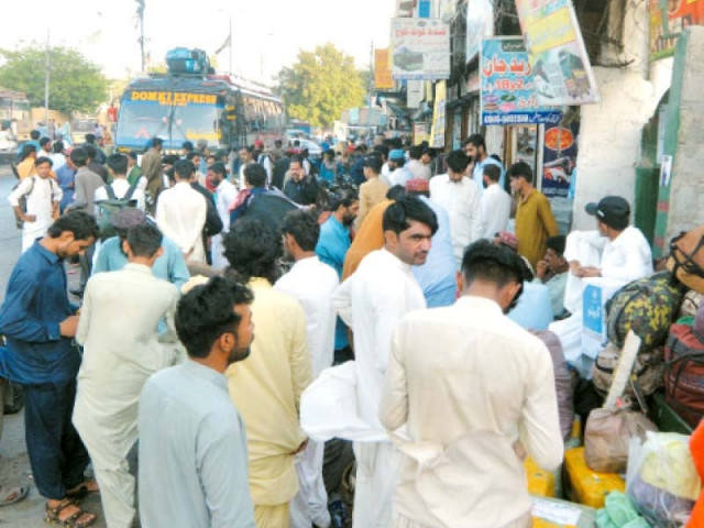 people stand in queue to get bus ticket for their hometowns to spend the festive occasion of eid with family and friends photo jalal qureshi express people stand in queue to get bus ticket for their hometowns to spend the festive occasion of eid with family and friends photo jalal qureshi express