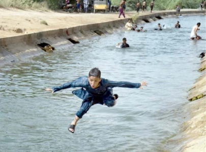 13 held for swimming in canal