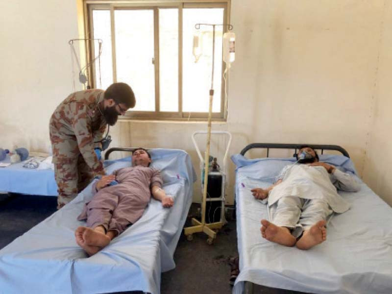 an fc doctor attends to patients at a medical camp in the pir koh area photo express