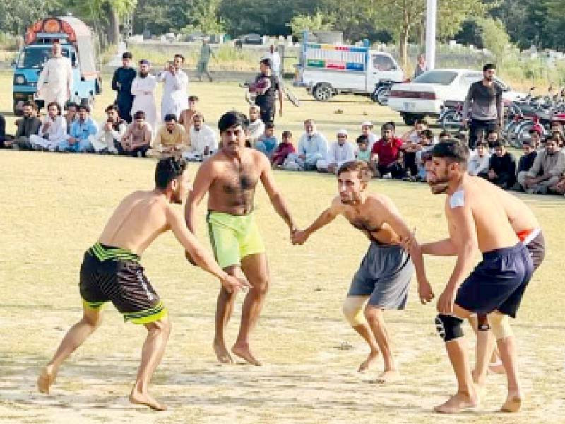 a kabaddi match is underway between teams from haripur district on saturday photo express