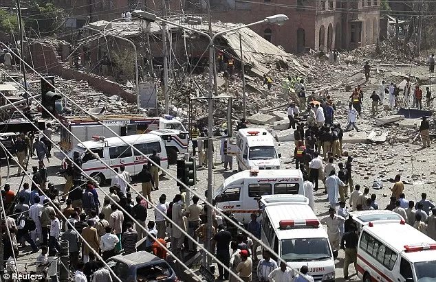 police and rescue workers gather at the site of a bomb attack in lahore on may 27 2009 photo reuters file police and rescue workers gather at the site of a bomb attack in lahore on may 27 2009 photo reuters file