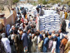 locals line up near a truck to get flour at the official rate in quetta amid a shortage of the commodity photo inp locals line up near a truck to get flour at the official rate in quetta amid a shortage of the commodity photo inp