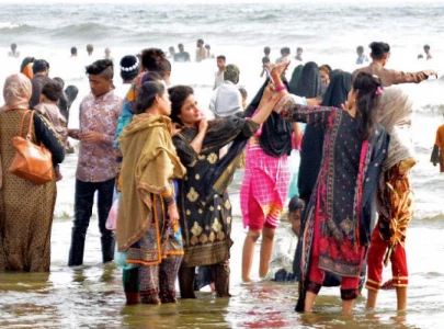 revelers hit the beach food streets revelers hit the beach food streets