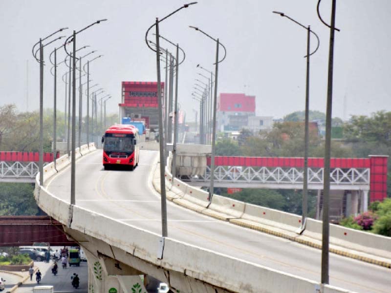 a metro bus plies on its elevated track in the garrison city as the service resumes after a four day suspension due to the law and order situation in the twin cities photo online