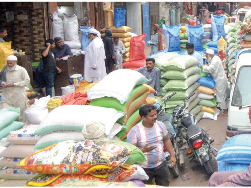stacks of sacks full of grain lie at the wholesale grain market of jodia bazaar in karachi photo jalal qureshi express