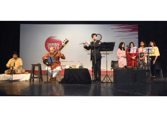 ustad nafees ahmed khan on sitar accompanies nakagawa yashush on japanese flute at pak japan fusion music concert held at the arts council of pakistan during the japan fest 2023 photo express ustad nafees ahmed khan on sitar accompanies nakagawa yashush on japanese flute at pak japan fusion music concert held at the arts council of pakistan during the japan fest 2023 photo express