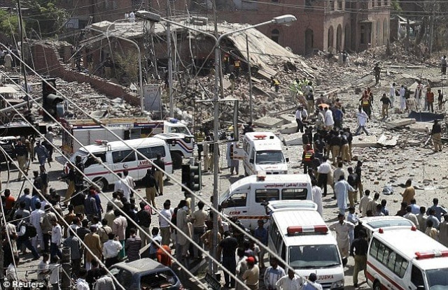police and rescue workers gather at the site of a bomb attack in lahore on may 27 2009 photo reuters file police and rescue workers gather at the site of a bomb attack in lahore on may 27 2009 photo reuters file