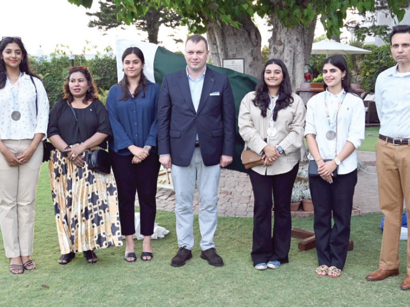 pakistani roweres pose with the consul general of russia andrey viktorovich fedorov at karachi boat club on saturday photo courtesy kbc