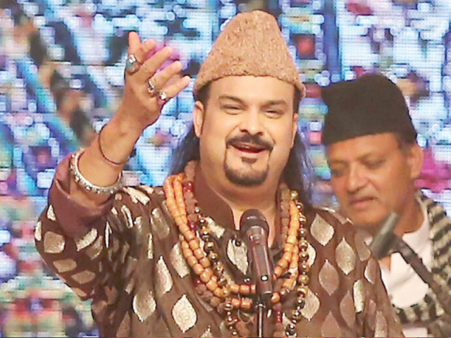 amjad spent a lifetime showing how a charismatic musical genius can win anyone s heart photo file amjad spent a lifetime showing how a charismatic musical genius can win anyone s heart photo file