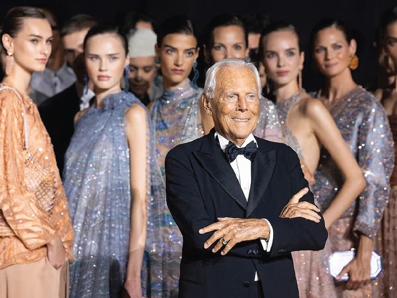 armani poses with models before presenting his spring summer 2025 collection photo reuters