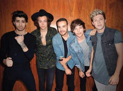 all five 1d albums return to uk charts after liam s death