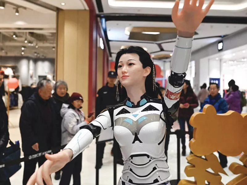 a robot gyrated to music at the event photo afp a robot gyrated to music at the event photo afp