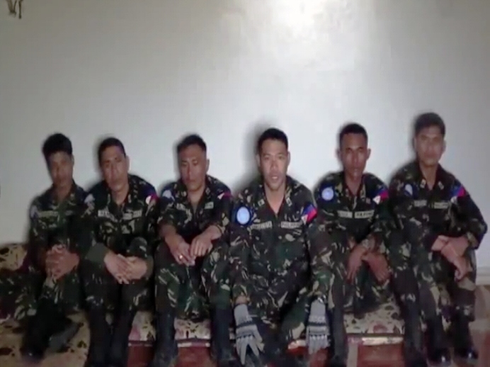 an image grab taken from a video uploaded on youtube on march 7 2013 allegedly shows six uniformed members of the united nations disengagement force who have been seized by rebels the previous day speaking at an undisclosed location photo afp