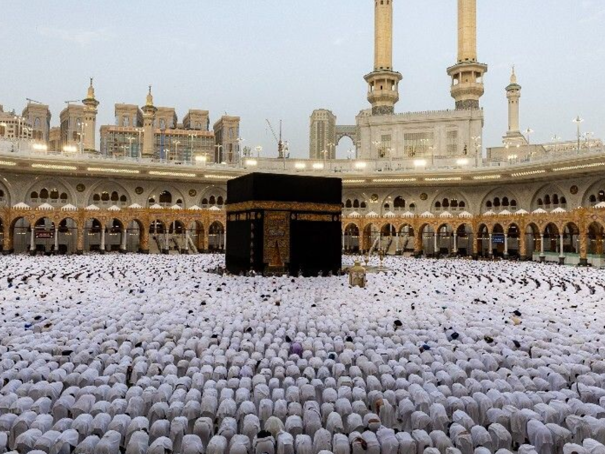 Worshippers offer congregational Eid prayers at the Kaaba in Makkah [AFP]