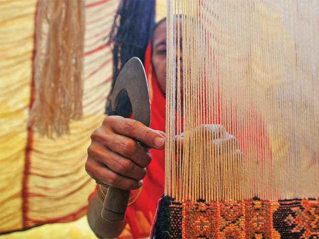 around 20 women from landhi set up stalls at the karachi university on thursday to display their handicrafts photo athar khan express around 20 women from landhi set up stalls at the karachi university on thursday to display their handicrafts photo athar khan express