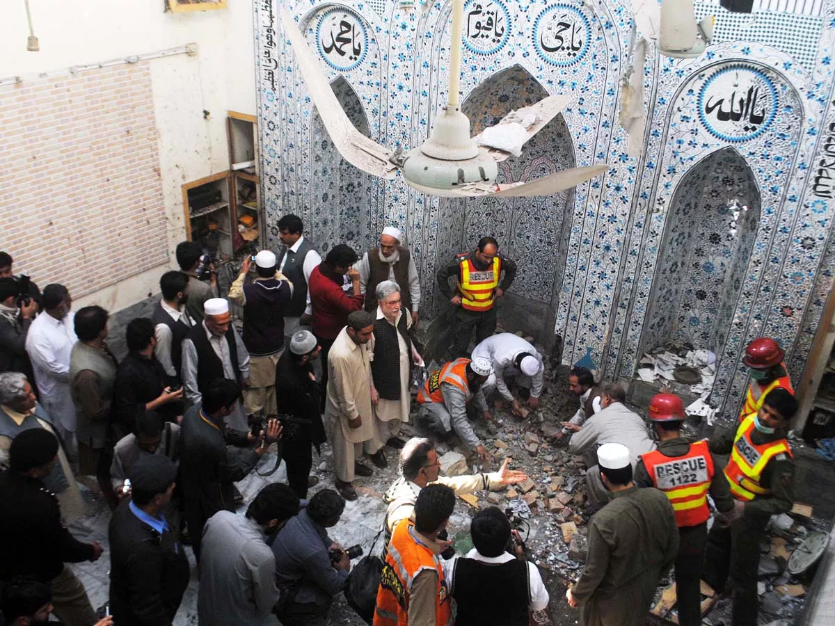 investigators inspect the site of explosion inside a mosque in peshawar on march 9 2013 photo muhammad iqbal express investigators inspect the site of explosion inside a mosque in peshawar on march 9 2013 photo muhammad iqbal express