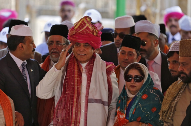 prime minister raja pervez ashraf gestures after offering prayers at the shrine of khwaja moinuddin chishti at ajmer sharif on march 9 2013 photo reuters