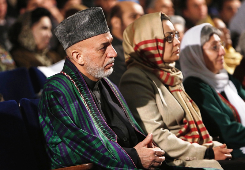 afghan president hamid karzai sits during an event to mark international women 039 s day in kabul photo reuters