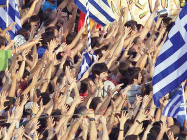 greek protesters raise arms in front of parliament building during a rally against an austerity package photo reuters greek protesters raise arms in front of parliament building during a rally against an austerity package photo reuters