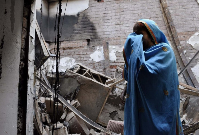 the incident of setting fire to 150 houses belonging to christians in badami bagh could have been averted if the police who was present on the occasion had stopped the 3 000 strong mob photo inp the incident of setting fire to 150 houses belonging to christians in badami bagh could have been averted if the police who was present on the occasion had stopped the 3 000 strong mob photo inp