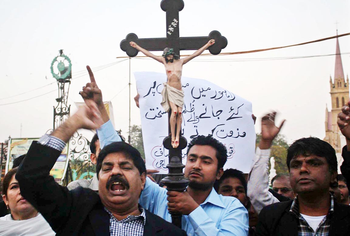 members of the christian community stage a protest against the badami bagh incident in karachi on saturday photo online