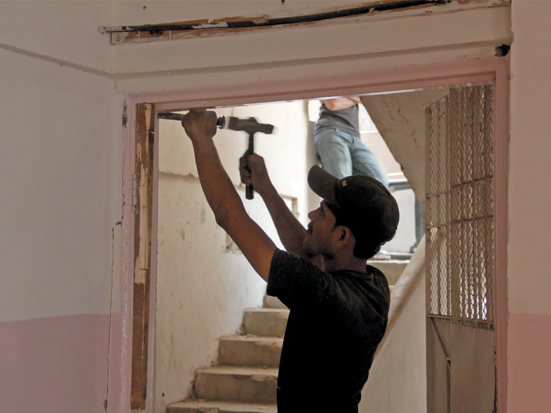 a deadly game of jenga without safety gear labourers take on abbas town apartments