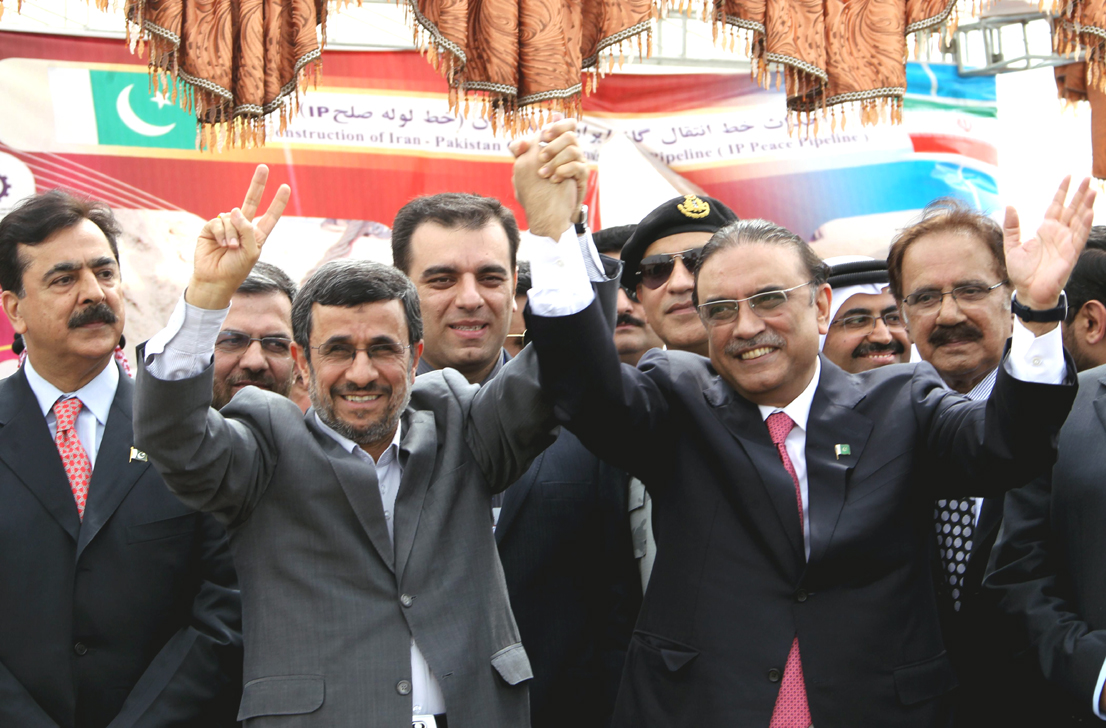 president asif ali zardari and his iranian counterpart mahmoud ahmadinejad raise their hands in triumph following the launch of the iran pakistan gas pipeline project photo afp