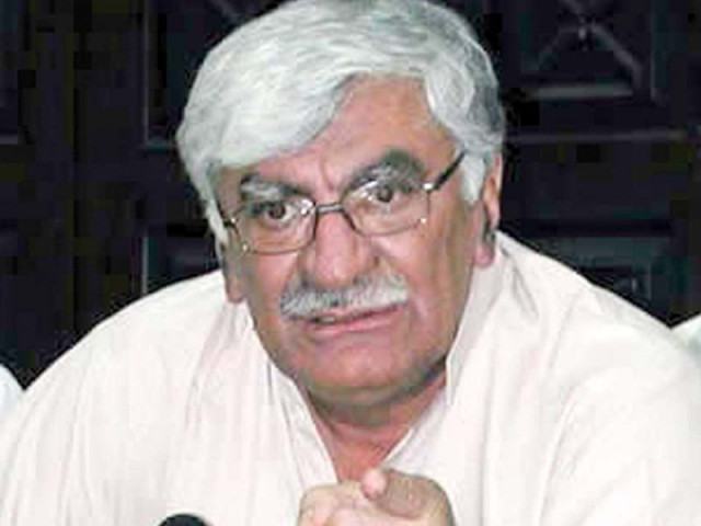 and old file photo of anp chief asfandyar wali and old file photo of anp chief asfandyar wali
