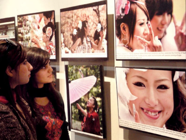 the photographs cover every aspect of contemporary japan including culture fashion museums places of worship marketplaces and the automobile industry photo inp the photographs cover every aspect of contemporary japan including culture fashion museums places of worship marketplaces and the automobile industry photo inp
