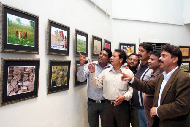 the pictures by 30 photo journalists and members of the lahore photo journalists association will be on display till march 17 photo ppi