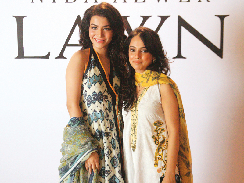 brand ambassador humaima malik and designer nida azwer at the launch photo publicity