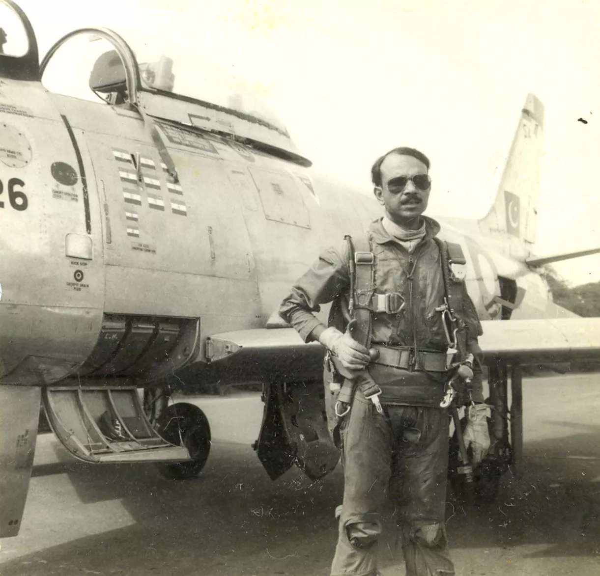 this undated photograph released by the pakistan air force shows mm alam standing next to his f 86 sabre photo paf this undated photograph released by the pakistan air force shows mm alam standing next to his f 86 sabre photo paf