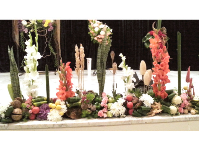 some of the flower arrangements displayed at the event photo express some of the flower arrangements displayed at the event photo express