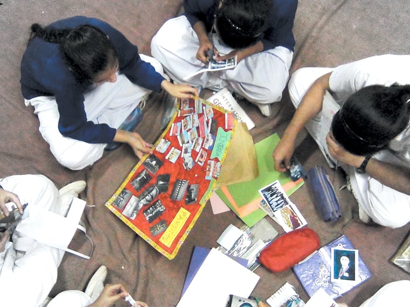 indian students prepare a poster for their counterparts across the border photo courtesy cap