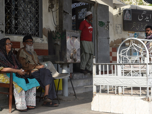 abdul sattar edhi sits with his wife bilquis edhi outside his office in karachi photo afp abdul sattar edhi sits with his wife bilquis edhi outside his office in karachi photo afp