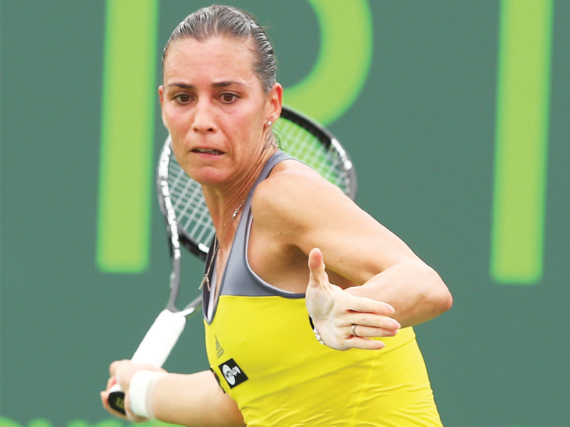 the miami masters kicked off with pennetta overcoming larsson in straight sets to book a match against williams photo afp